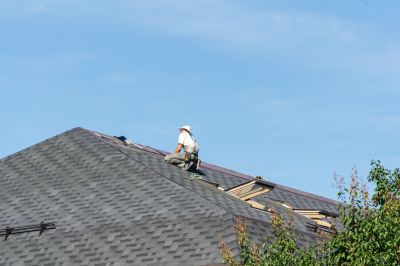Repair Work on Asphalt Roof